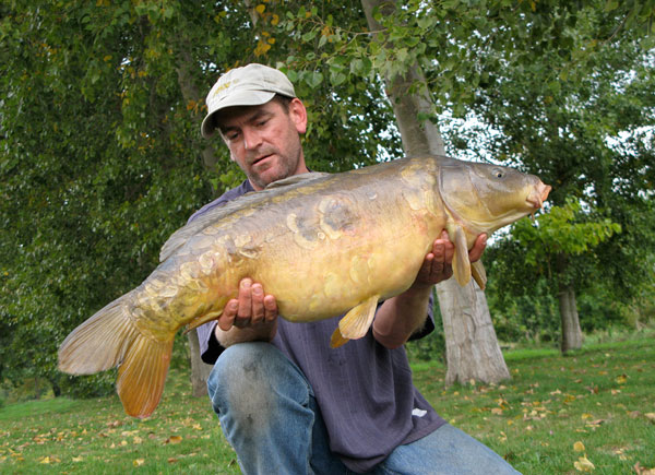 Steve with enormous carp known as Ugly Boy