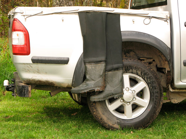 waders drying on back of pick-up